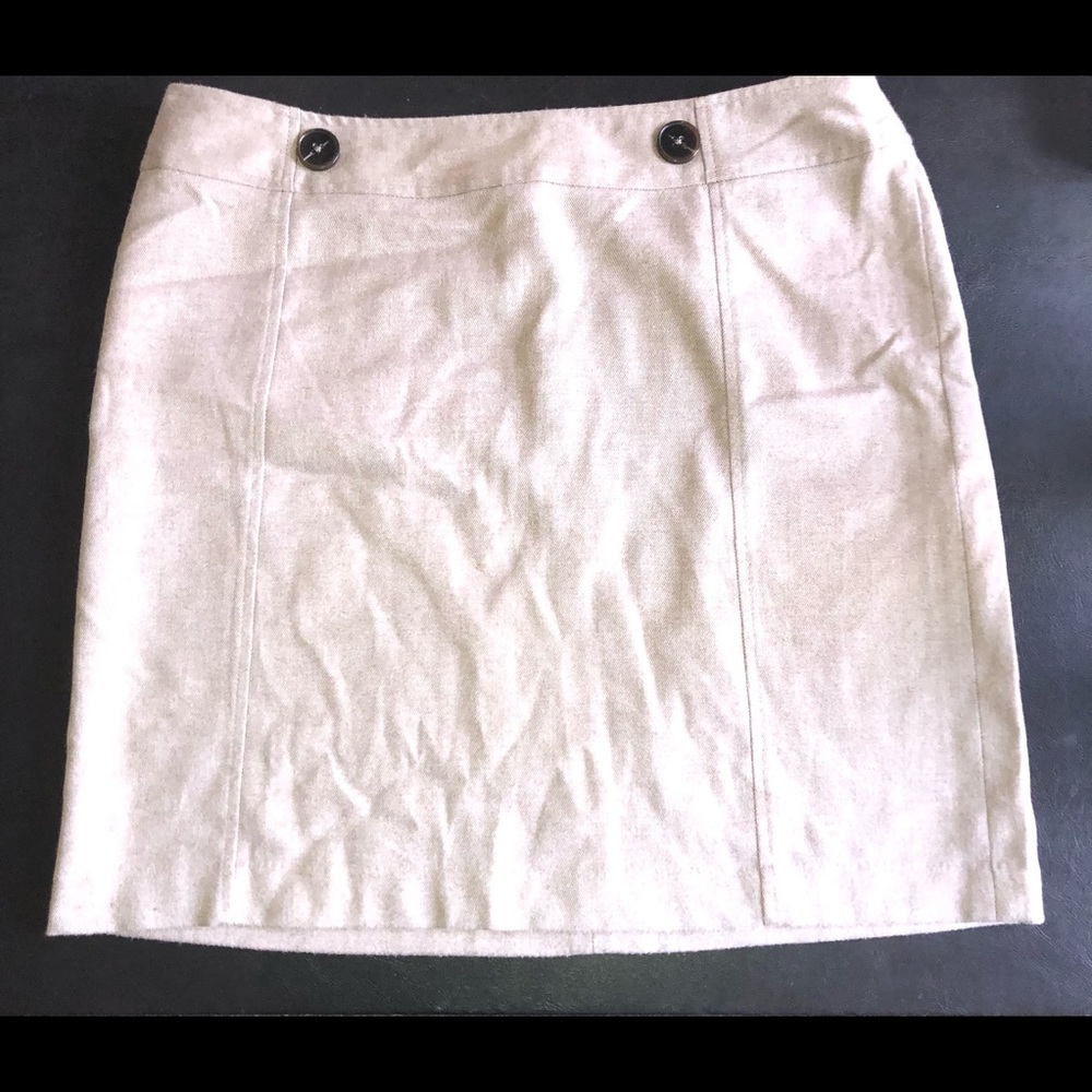 Beige skirt with brown button detail